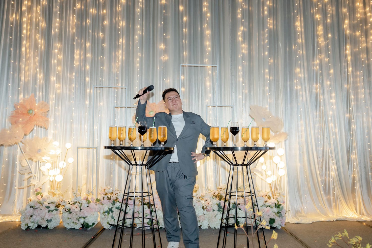Emcee Dixon hosting a wedding on stage in Singapore