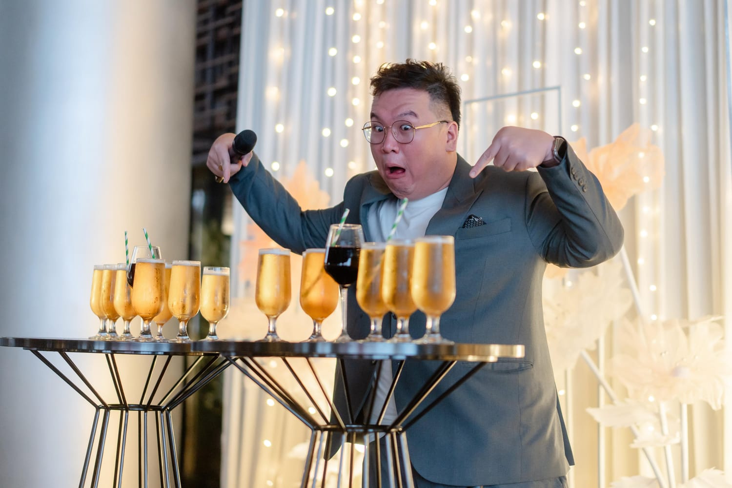 Emcee Dixon hosting a wedding on stage in Singapore